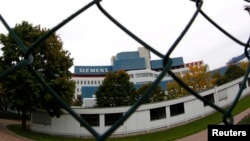 Офис Siemens AG в Мюнхене, 30 сентября 2013 года. Иллюстрационное фото