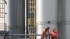 Kazakhstan -- Employees work at a drill rig at an offshore island in the northern Caspian Sea, part of the Kashagan oilfield, 11Oct2012